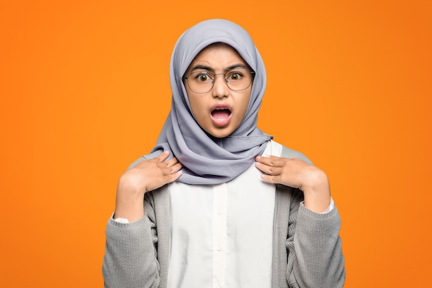 Beautiful Asian woman shocked wearing eyeglass