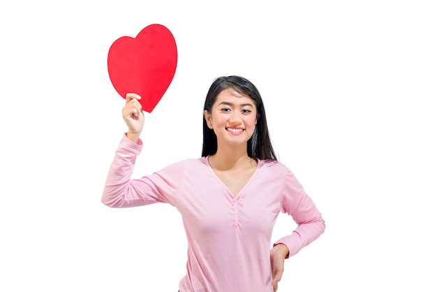 Beautiful asian woman showing red paper hearts