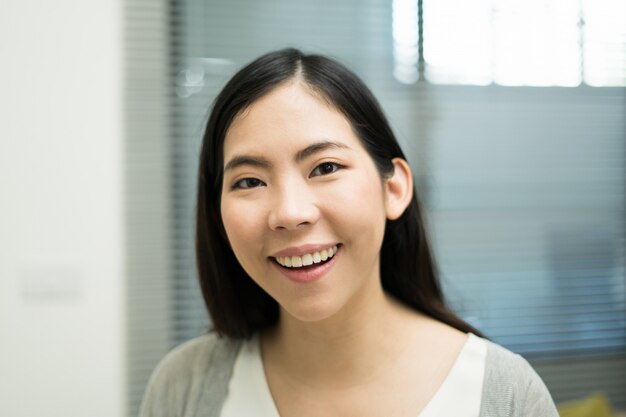 Beautiful asian women smiling and look at the camera