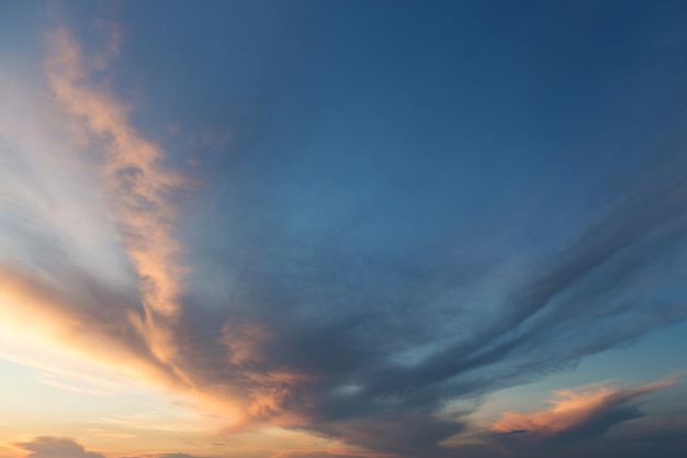 Beautiful atmospheric dramatic clouds in the evening at sunset.