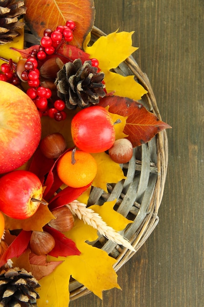 Beautiful autumn composition on wooden background