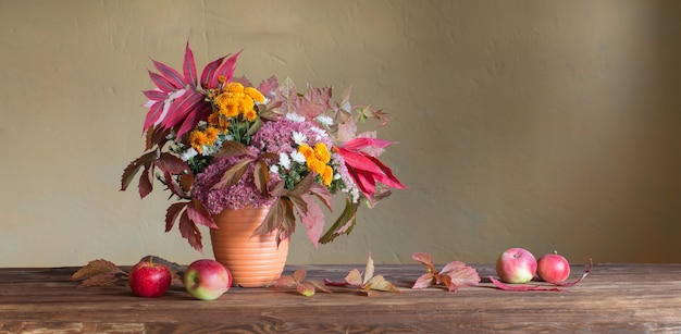 Beautiful autumnal composition on wooden table