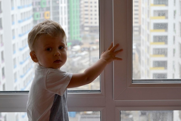 Beautiful baby boy with child face posing photographer