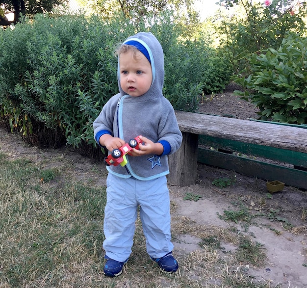 Beautiful baby boy with child face posing photographer