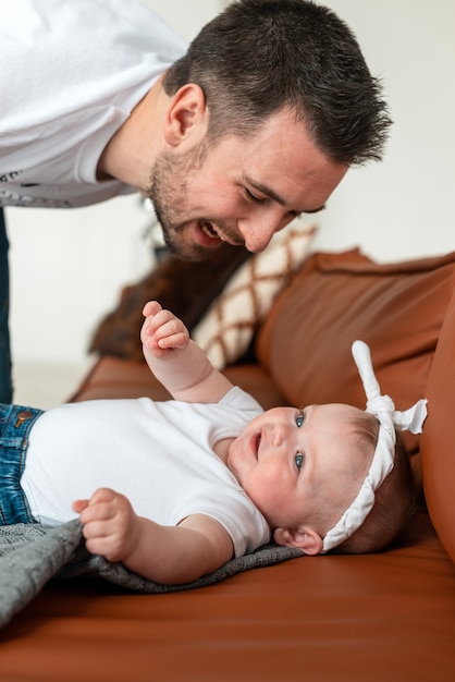 Beautiful baby girl and her young father