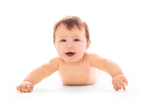 A beautiful baby lying on a white background