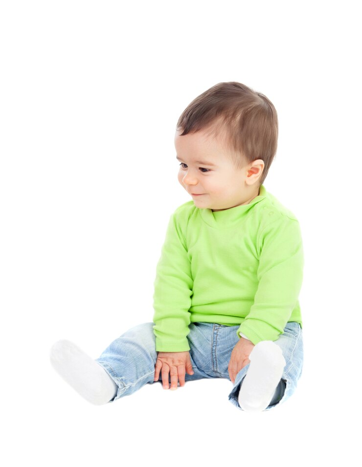 Photo beautiful baby  sitting on the floor