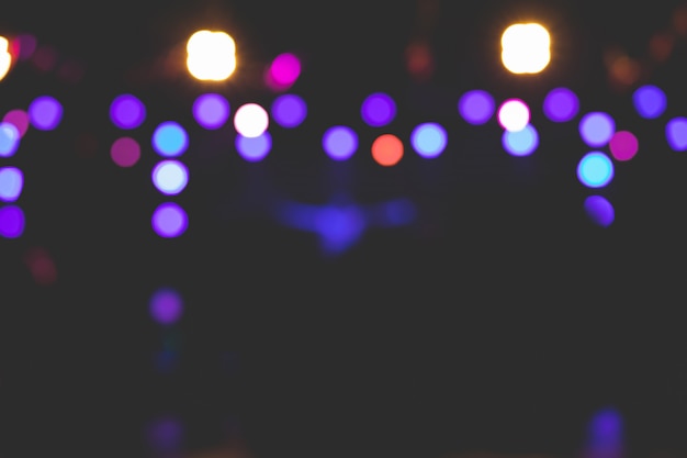 Beautiful background images of bokeh from various lights on stage at night.