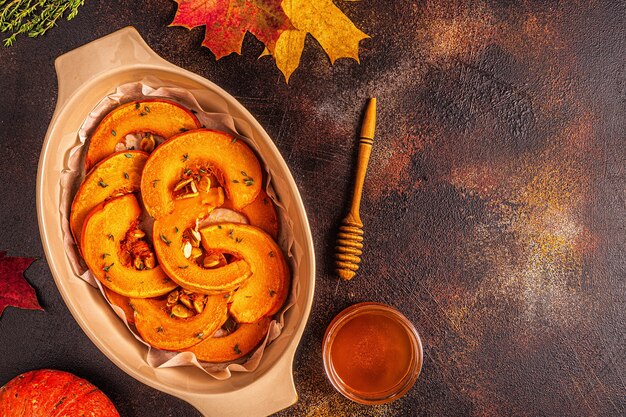 Beautiful baked slices of pumpkin in tray