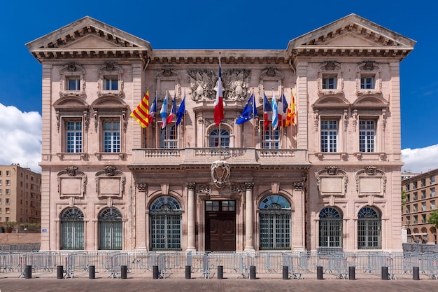 Beautiful baroque building of Marseille City Hall in old Vieux Port, Marseilles on sunny day, France