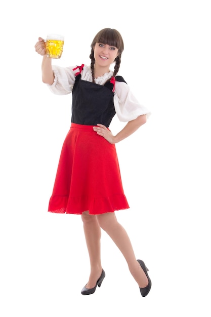 Beautiful bavarian girl with cup of beer over white