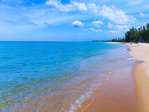 Beautiful Beach waves sea surface seashore Amazing waves crashing on sandy shoreBeautiful sand beachNature and travel background