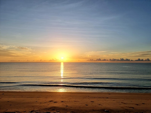 The beautiful beach with sunrise in the early morning