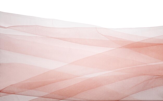 beautiful beige tulle fabric on white background top view