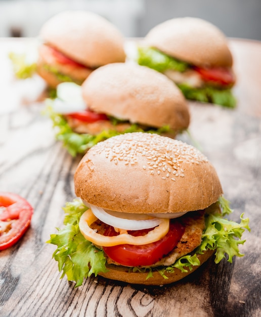 Beautiful big hamburger on a wooden table