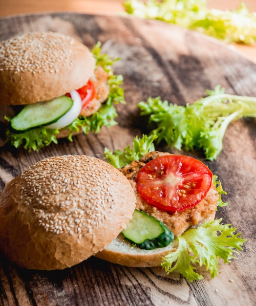 Beautiful big hamburger on a wooden table