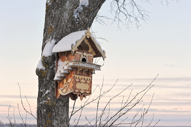 Beautiful birdhouse on the tree