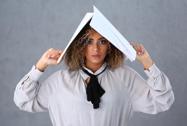 Beautiful black woman portrait holds paper documents