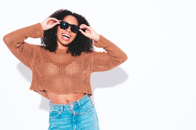 Beautiful black woman with afro curls hairstyle