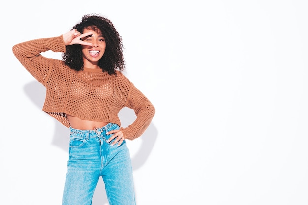 Beautiful black woman with afro curls hairstyle