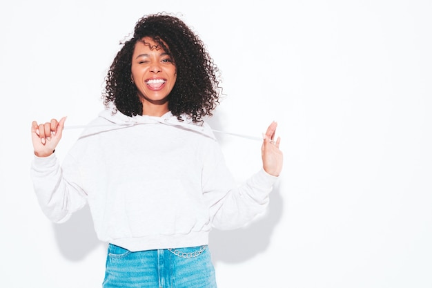 Beautiful black woman with afro curls hairstyle