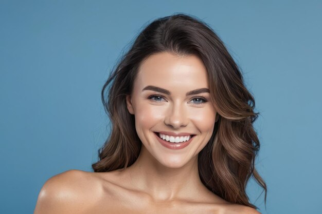 Beautiful blond model woman with naked shoulders white teeth smile healthy long flowing hair and beauty skin on blue background Concept of advertising a dentist and facial care Generative AI