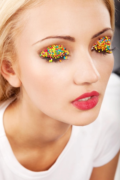 Beautiful  blond woman with bright easter makeup