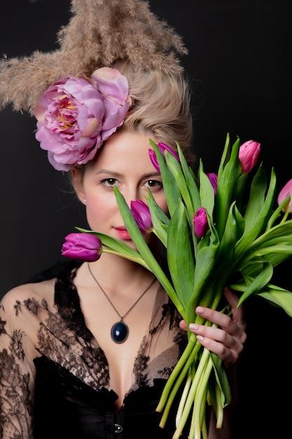 Beautiful blonde countess with tulips