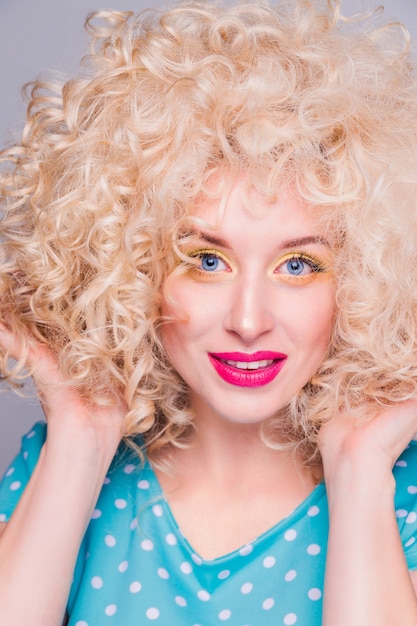 Premium Photo Beautiful Blonde Girl In Retro Style With Voluminous Curly Hairstyle