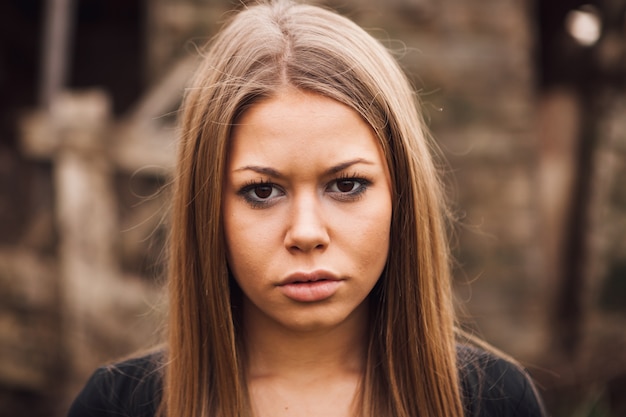 Beautiful blonde girl wih sad expression