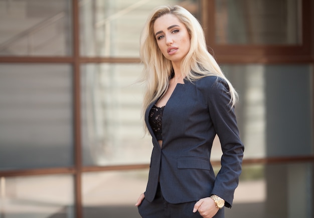 Beautiful blonde woman in an elegant suit