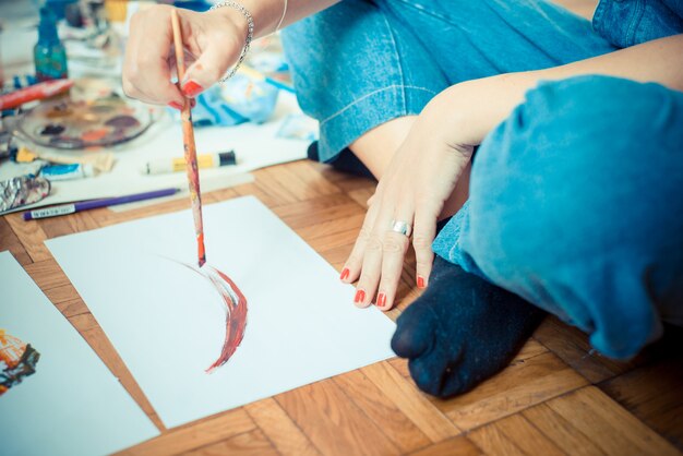 beautiful blonde woman painter