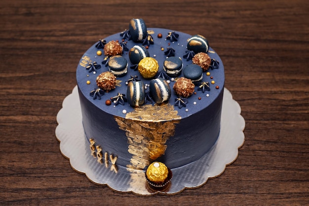 Beautiful blue cake decorated with macarons