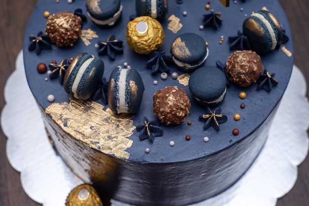 Beautiful blue cake decorated with macarons