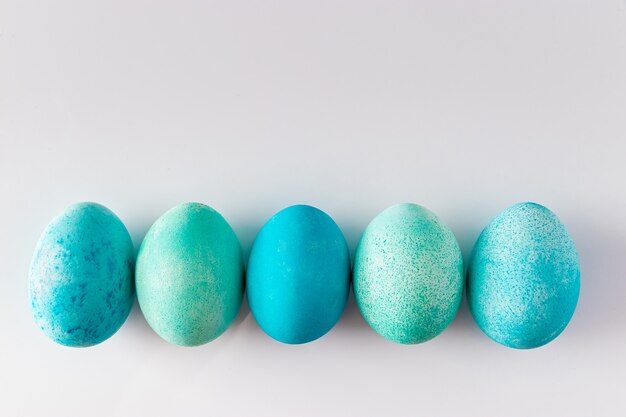 Beautiful blue easter eggs on a light background 