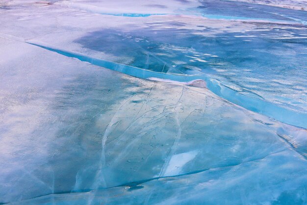 Красивый синий фон поверхности льда