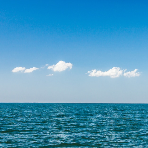 Beautiful blue sky and clouds over tropical ocean