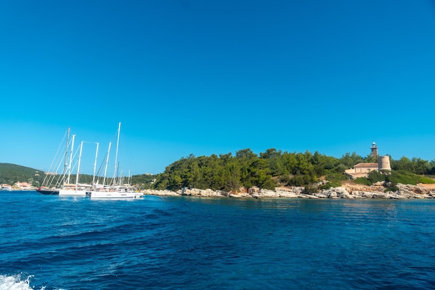 Beautiful boats in the fishing port of Fiskardo village on the island of Kefalonia Greece