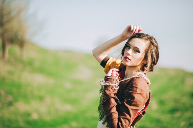 Beautiful bohemian girl in spring garden