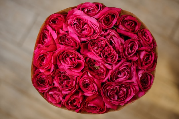 Beautiful bouquet of a crimson peony roses