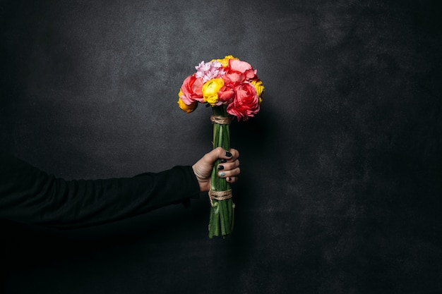 Beautiful bouquet of flowers on black background