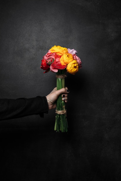 Beautiful bouquet of flowers on black background