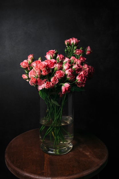 Beautiful bouquet of flowers on black background