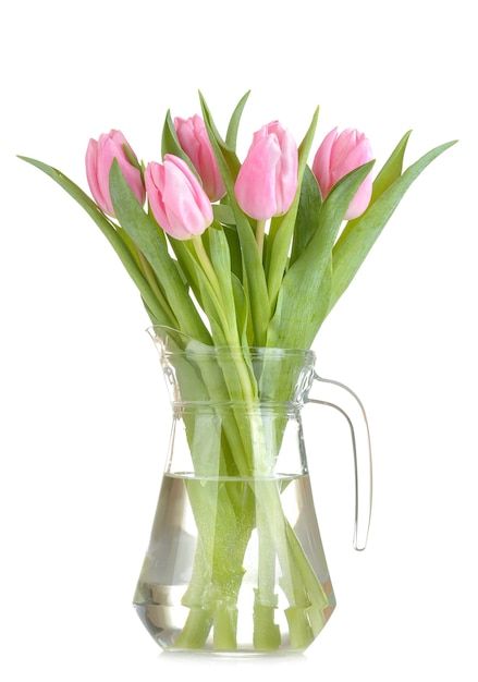 白い孤立した表面の花瓶にピンクのチューリップの花の美しい花束