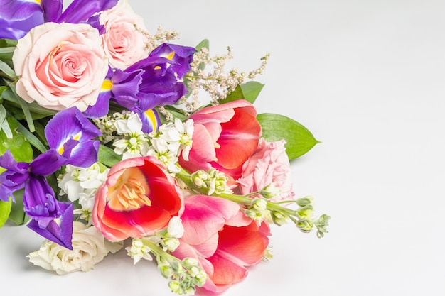 A beautiful bouquet of fresh flowers isolated on white surface