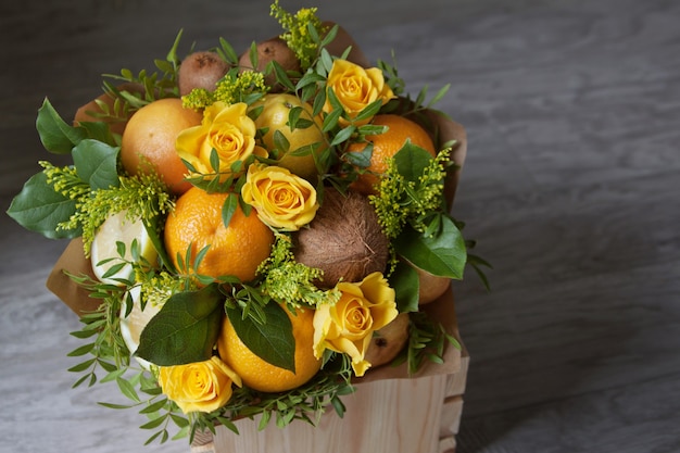 Beautiful bouquet of fruits and flowers