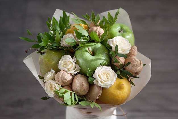 Beautiful bouquet of fruits and flowers