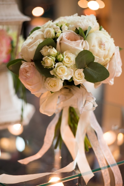 Beautiful bouquet of light roses.