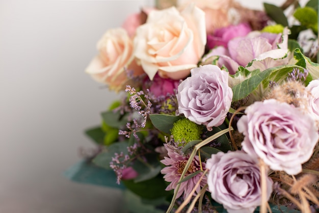 Beautiful bouquet of mixed flowers. greeting card. horizontal image, selective focus, blurred background