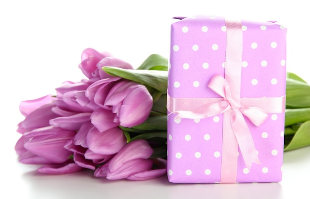 Beautiful bouquet of purple tulips and gift box, isolated on white